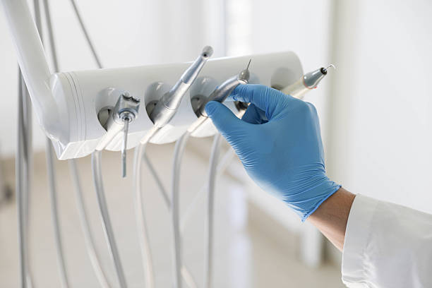 Professional Invisalign Clear Aligners technician working in Chouteau, OK